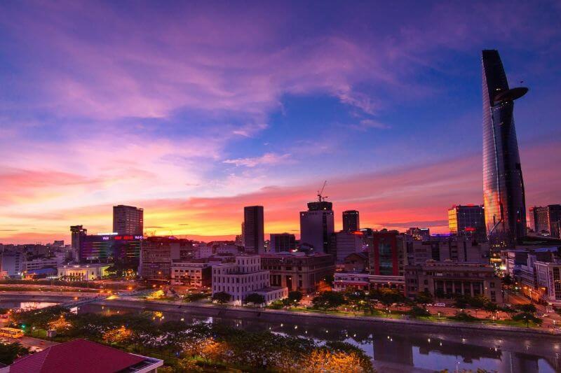 Sun PhuQuoc Airways aircraft and the Ho Chi Minh City skyline, illustrating the new direct Ho Chi Minh City-Shanghai route