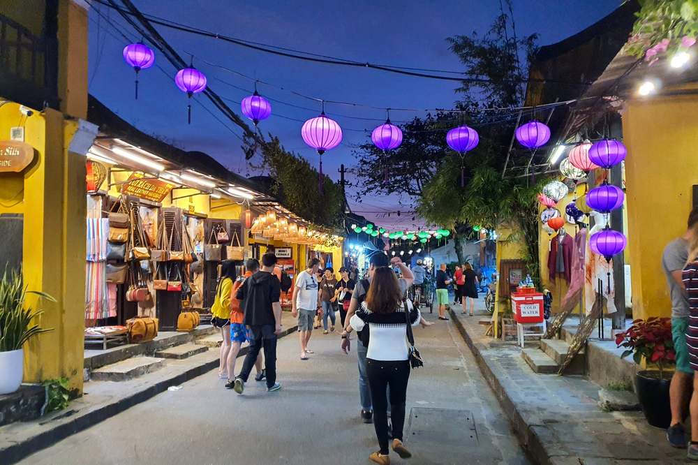 Lantern-lit street in Hoi An Old Town in the evening
