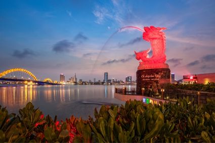 Carp-dragon statue on the Han River at night, Da Nang