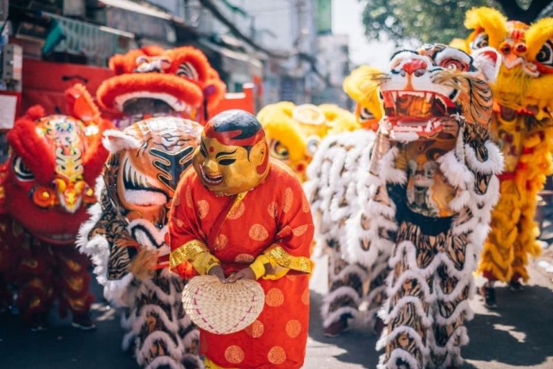 Vietnamese lion dance with colorful lion costume performed during Tet and festive celebrations