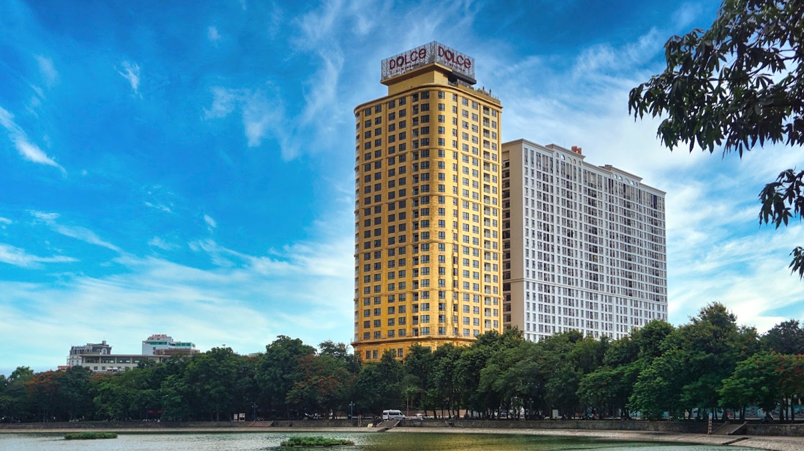 Gold-plated facade of Dolce by Wyndham Hanoi Golden Lake opposite Giang Vo Lake