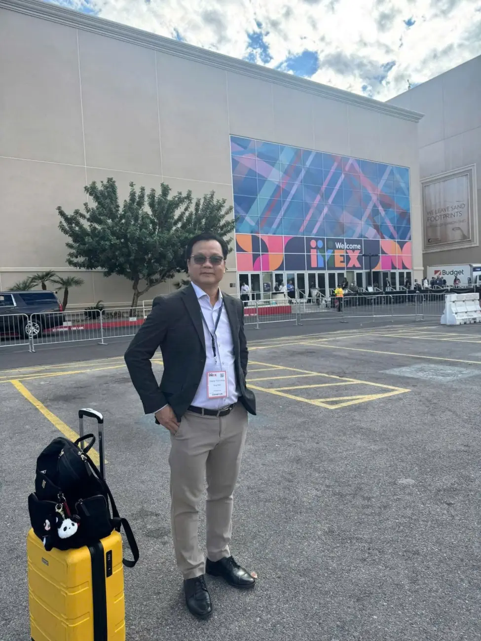 Dong Hoang Thinh, founder of Dong DMC, at IMEX America 2025 with an exhibitor badge