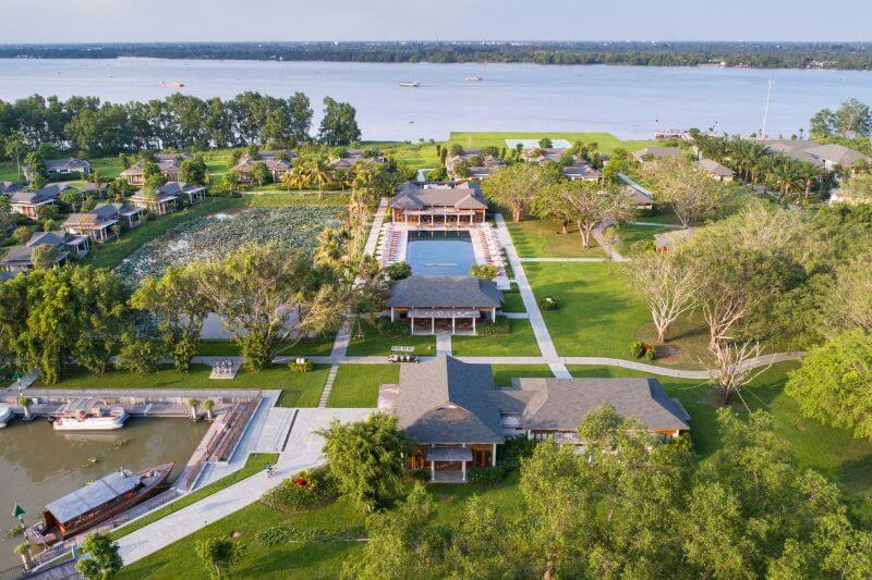 Legacy Mekong floating resort architecture and river setting