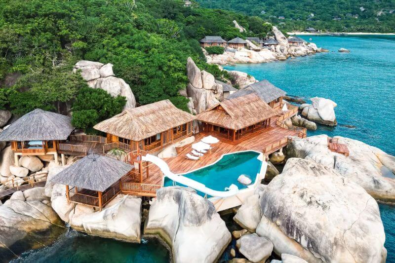 Six Senses Ninh Van Bay villas and limestone coastal scenery