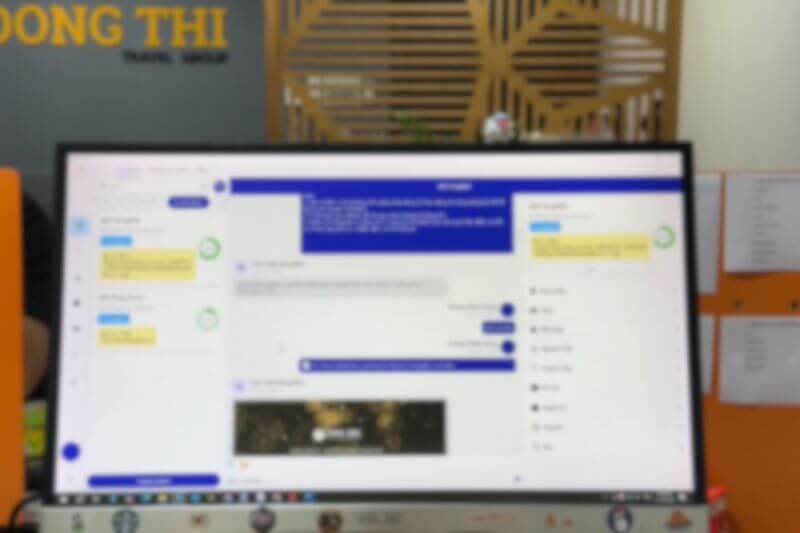 Dong DMC coordinator managing pod manifest with digital vouchers and printed timing sheet before Old Town photo block