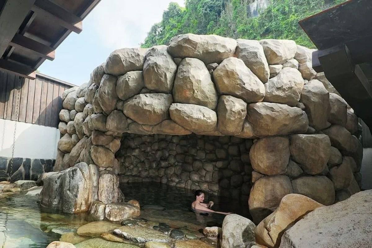 Outdoor rock onsen bath at Hilton Quang Hanh Onsen Resort
