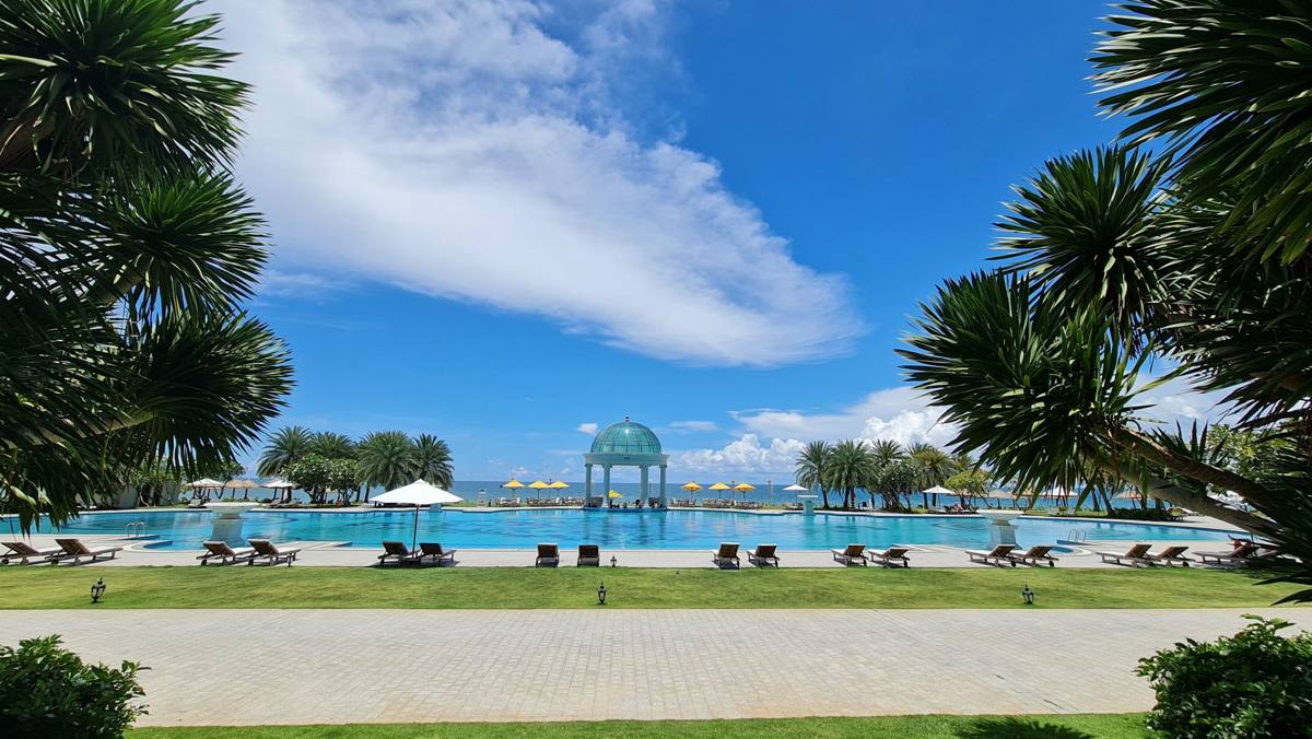 Resort pool with a glass-domed gazebo facing the sea, Phu Quoc
